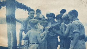 1917-Boys looking at pictures of themselve ssmaller.jpg 1917-Boys looking at pictures of themselve ssmaller.jpg